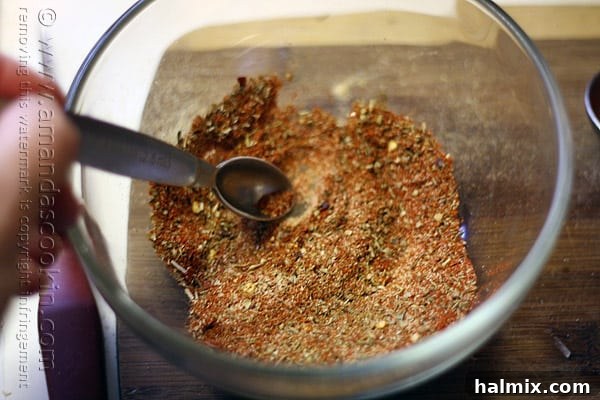 Hearty Chicken Chili with Black Beans and Sweet Corn 7 A crisp close-up of a clear bowl filled with a fragrant blend of spices, ready for the chili.