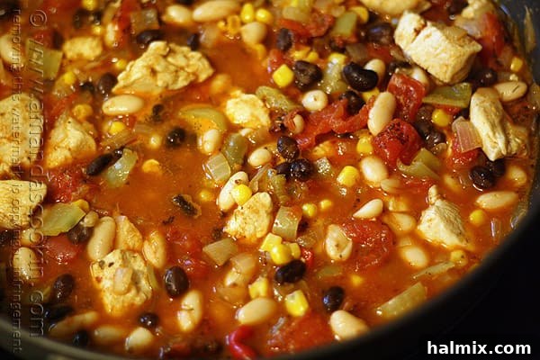 A delicious close-up of the finished chicken chili with black beans and corn, ready to be enjoyed.