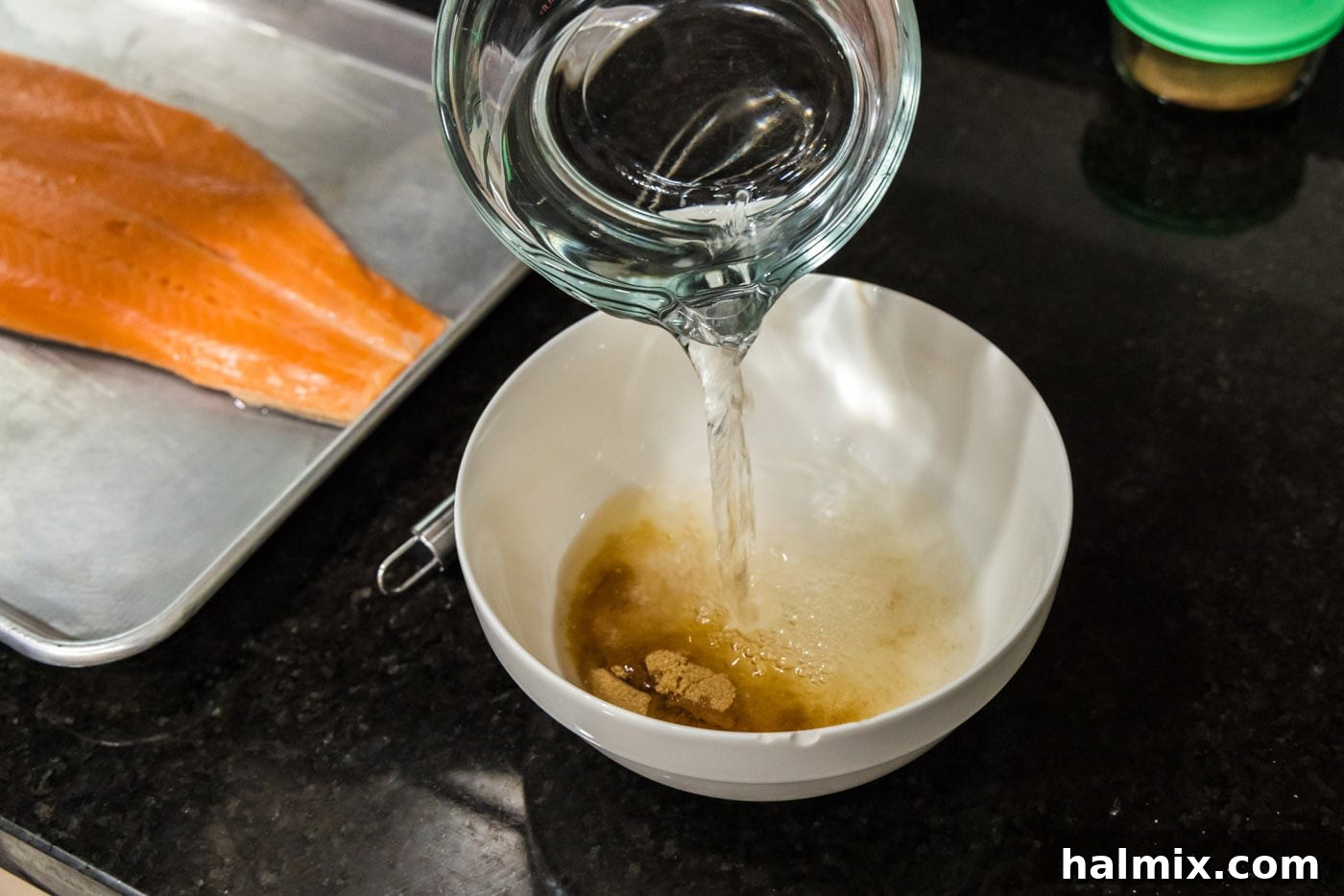 pouring water over brown sugar and salt