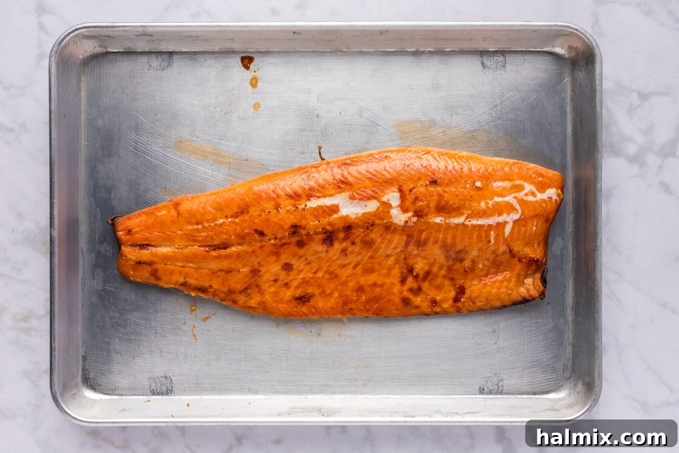 finished smoked trout on baking sheet