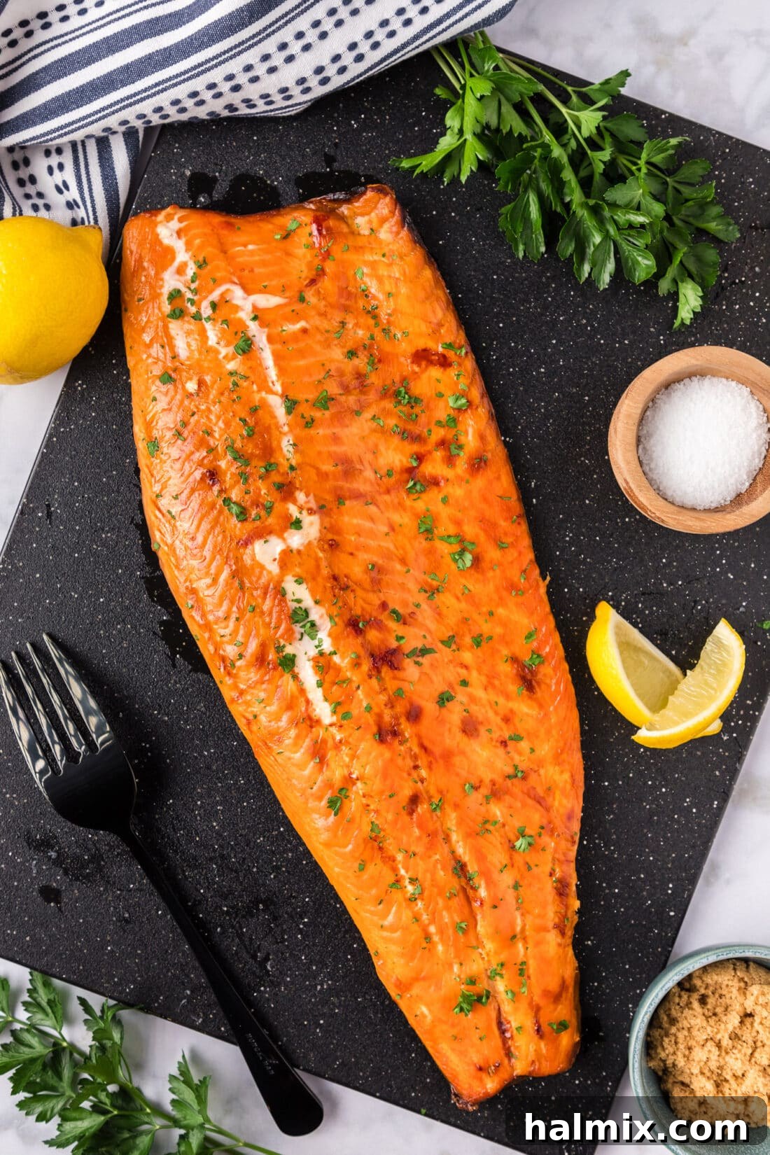 Overhead photo of Smoked Trout on a black board
