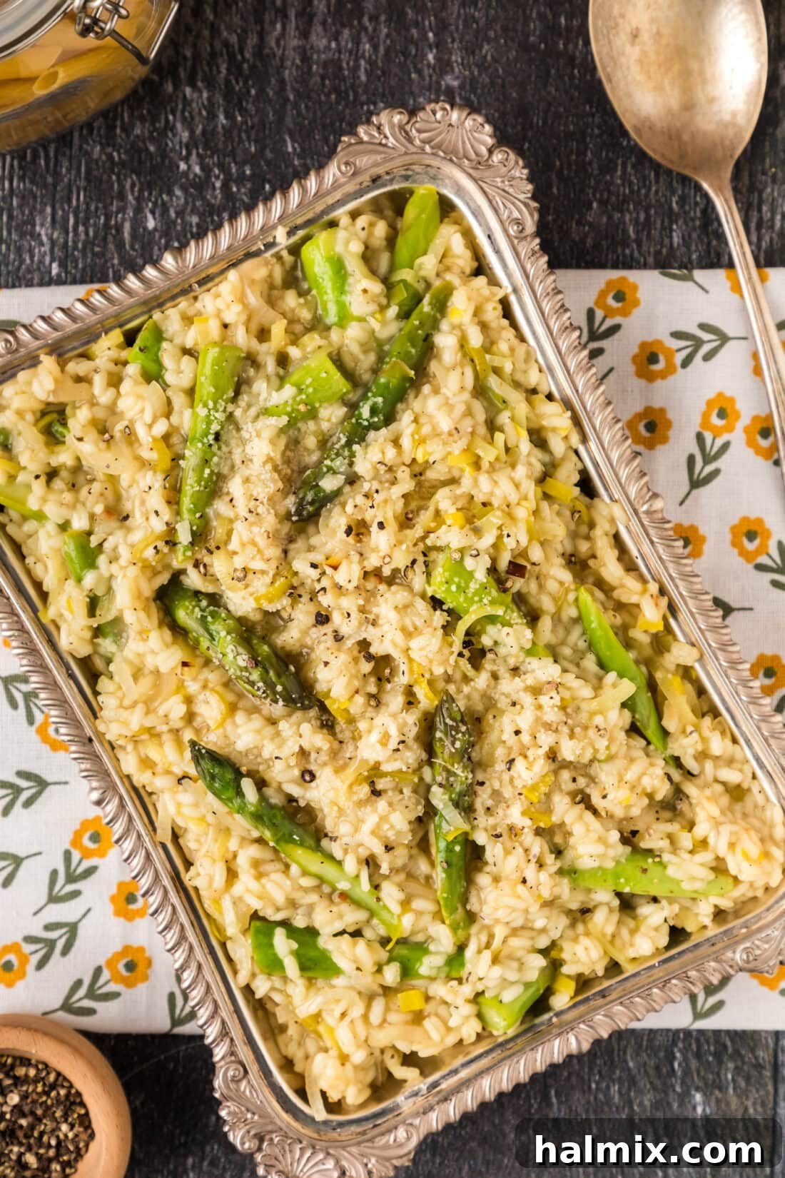 Verdant Asparagus Risotto 3 Serving platter of Creamy Asparagus Risotto garnished with fresh herbs