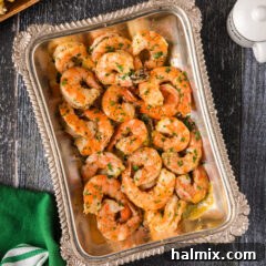 Garlic Butter Baked Shrimp 6 Baked Shrimp in an antique platter, showcasing the golden-pink hues.