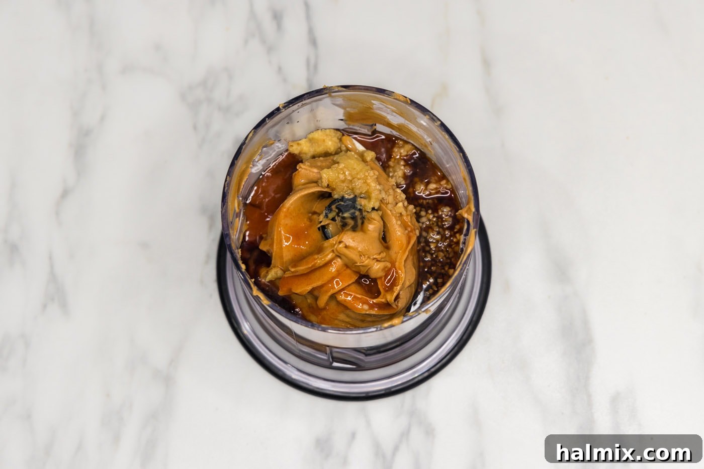 peanut butter chicken sauce in a mini processor