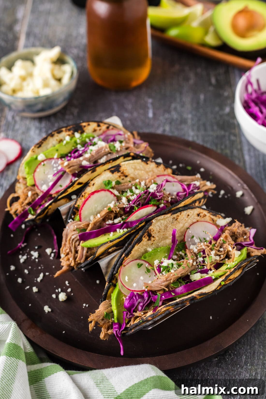 Mouthwatering Pulled Pork Tacos 6 Three Pulled Pork Tacos on a plate