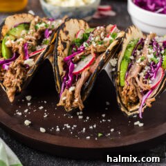 Mouthwatering Pulled Pork Tacos 7 Pulled Pork Tacos on a plate