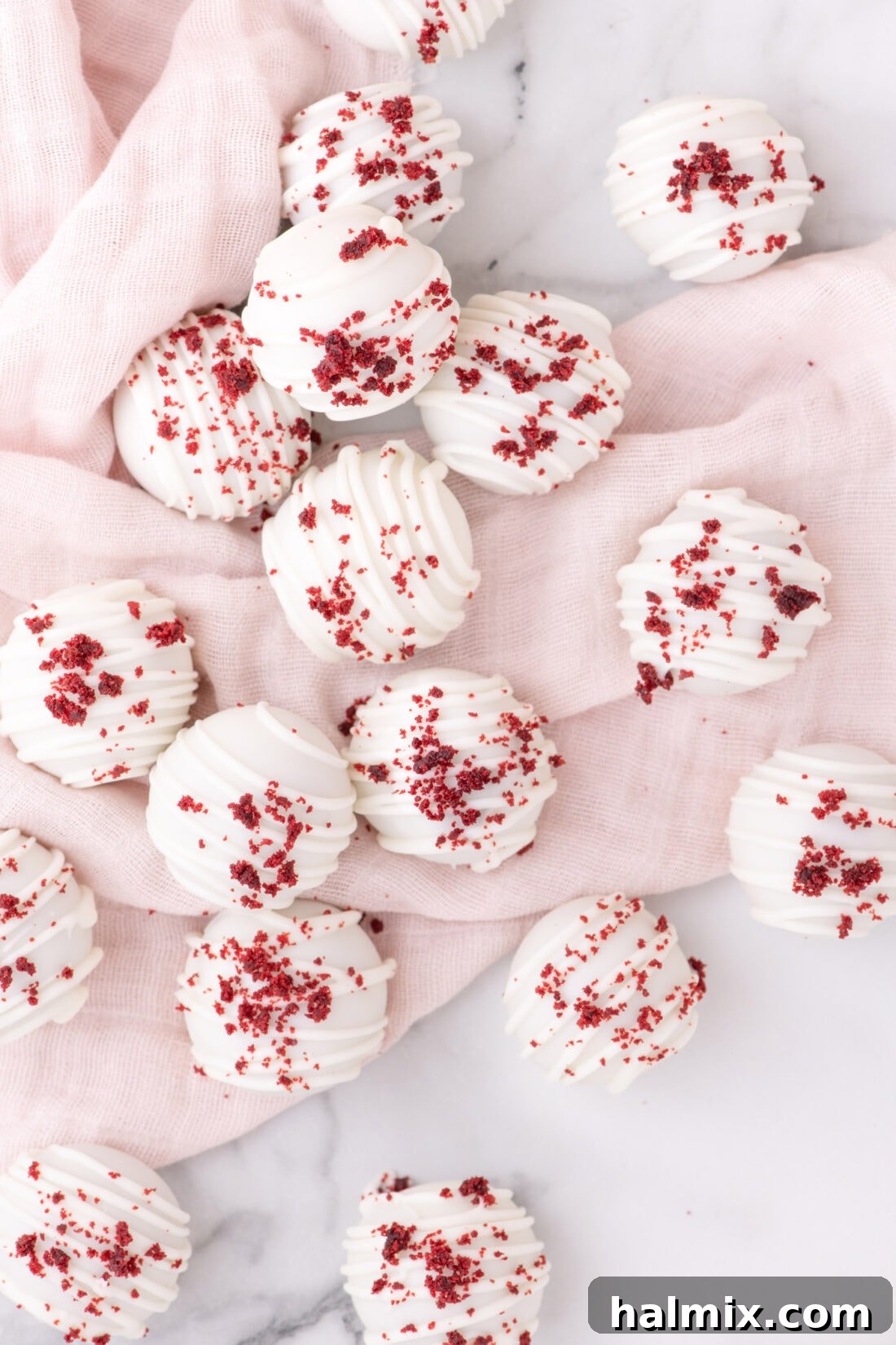 Overhead photo of a tray of freshly made Red Velvet Cake Balls