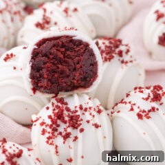 Close up photo of Red Velvet Cake Balls with one cut in half