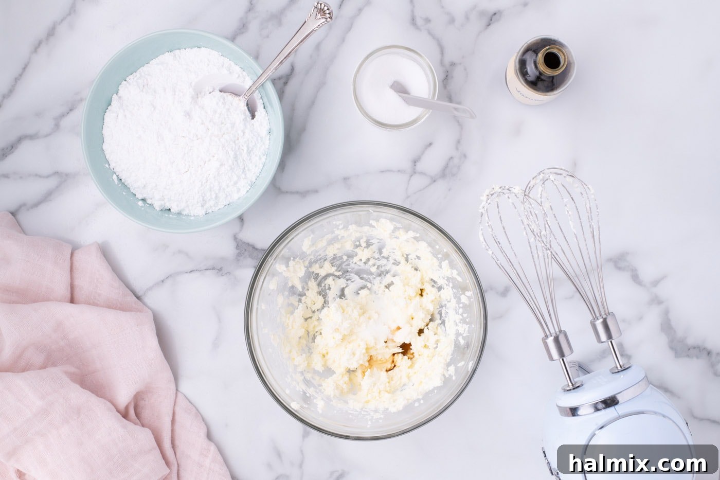 Softened butter and cream cheese beaten together in a mixing bowl