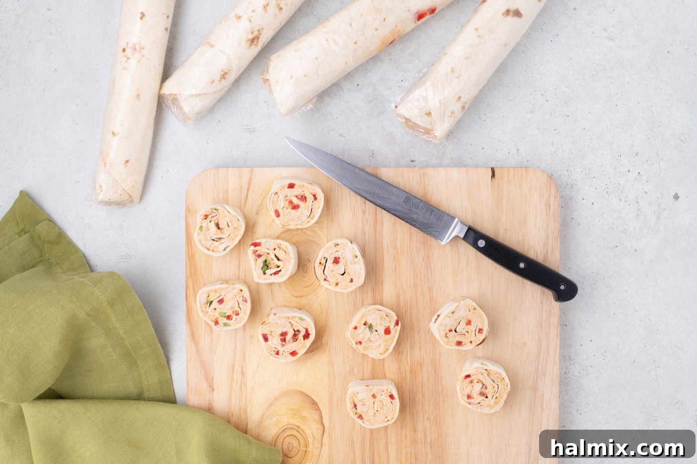 sliced Mexican pinwheels on a cutting board