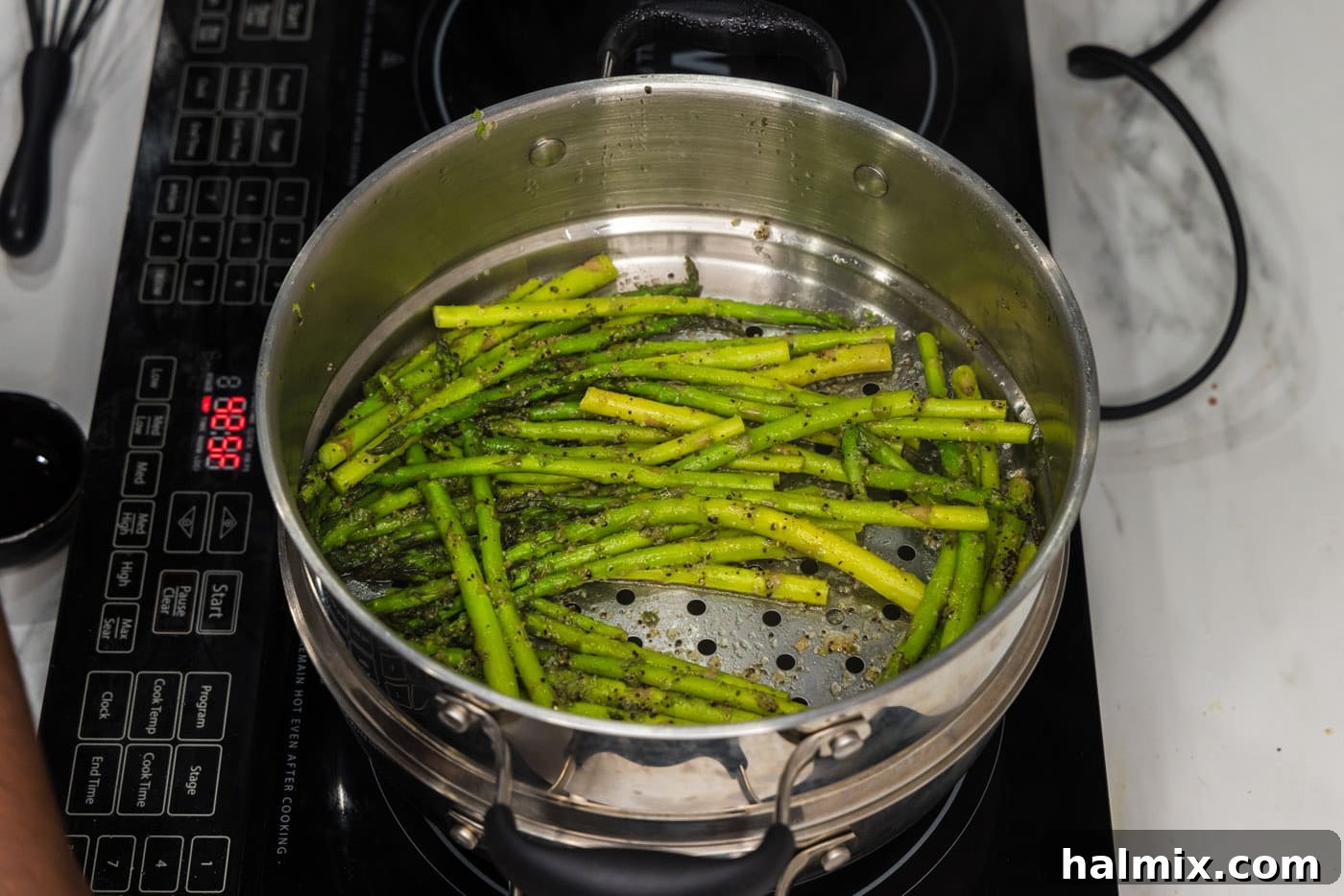 Spring's Tender Green Spears 5 Steamed asparagus in a pot