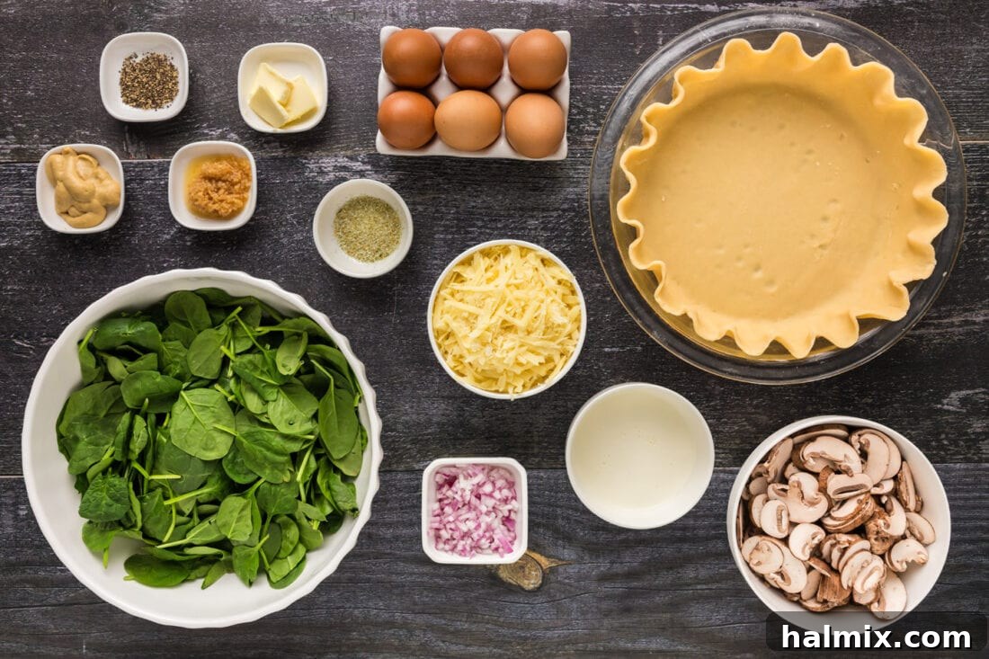 A vibrant flat lay photo showcasing all the fresh ingredients artfully arranged for the Spinach Mushroom Quiche, including spinach, mushrooms, eggs, cheese, and aromatics.