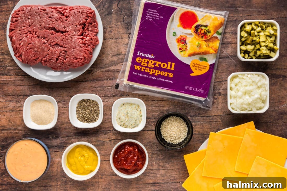 A vibrant flat lay photo showcasing all the fresh ingredients needed to make Big Mac Egg Rolls, including ground beef, cheese, pickles, onions, and egg roll wrappers.